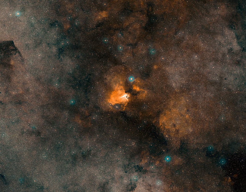 This image is a colour composite of the Omega Nebula (M 17) made from exposures from the Digitized Sky Survey 2 (DSS2). The field of view is approximatelly 4.7 x 3.7 degrees.