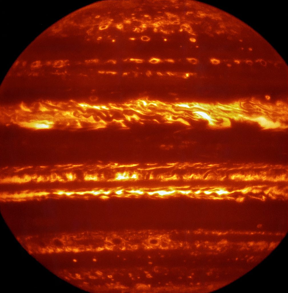 In preparation for the imminent arrival of NASA’s Juno spacecraft in July 2016, astronomers used ESO’s Very Large Telescope to obtain spectacular new infrared images of Jupiter using the VISIR instrument. They are part of a campaign to create high-resolution maps of the giant planet to inform the work to be undertaken by Juno over the following months, helping astronomers to better understand the gas giant. This false-colour image was created by selecting and combining the best images obtained from many short VISIR exposures at a wavelength of 5 micrometres.