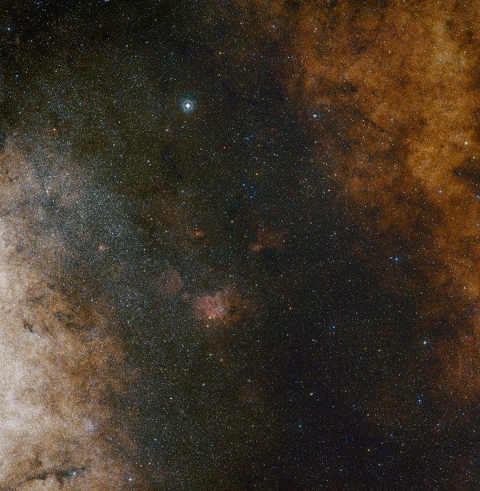 This visible light wide-field view shows the rich star clouds in the constellation of Sagittarius (the Archer) in the direction of the centre of our Milky Way galaxy. The entire image is filled with vast numbers of stars — but far more remain hidden behind clouds of dust and are only revealed in infrared images. This view was created from photographs in red and blue light and forming part of the Digitized Sky Survey 2. The field of view is approximately 3.5 degrees x 3.6 degrees.