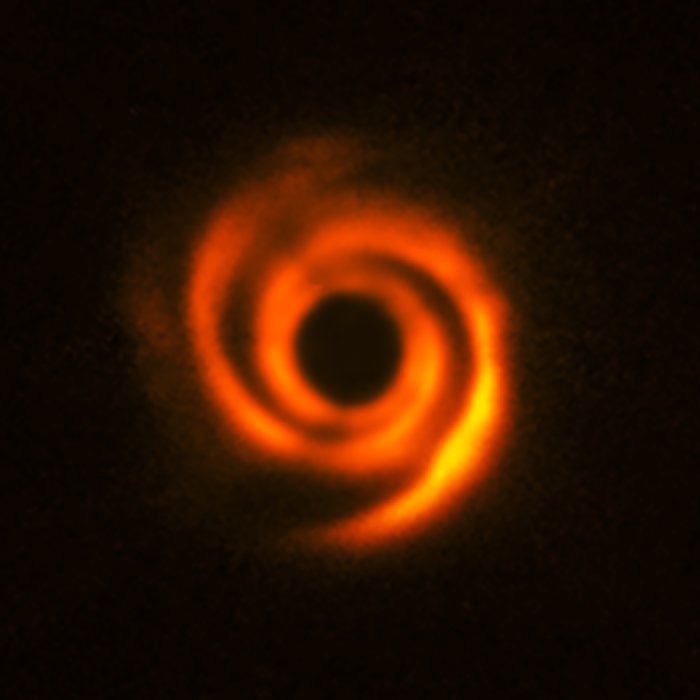 Using the ESO’s SPHERE instrument at the Very Large Telescope, a team of astronomer observed the planetary disc surrounding the star HD135344B, about 450 light-years away. The disc shows prominent spiral arm-like structures. These are thought to have been created by one or multiple massive protoplanets, destined to become Jupiter-like worlds.